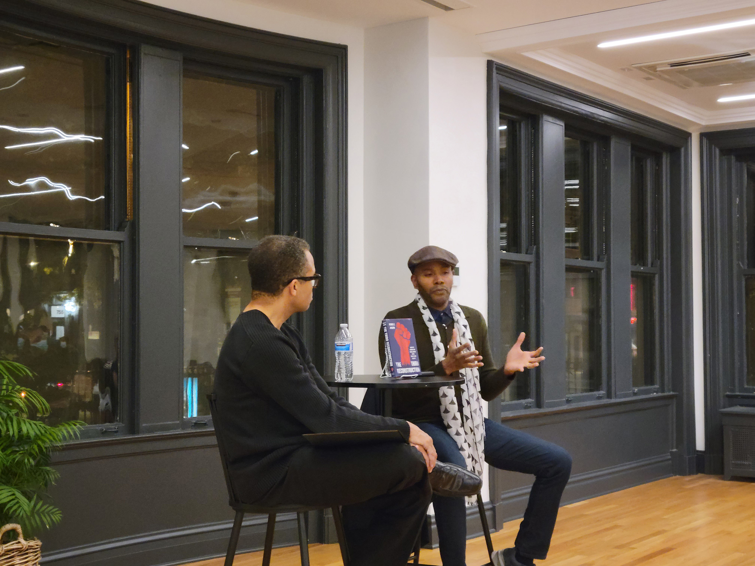Two people in conversation at a Haymarket House event.